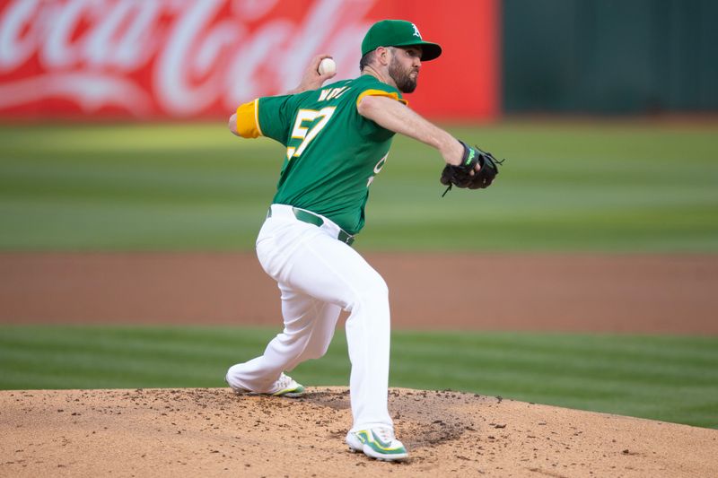 Apr 2, 2024; Oakland, California, USA; Oakland Athletics pitcher Alex Wood (57) delivers a pitch against the Boston Red Sox during the first inning at Oakland-Alameda County Coliseum. Mandatory Credit: D. Ross Cameron-USA TODAY Sports