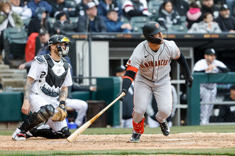 Apr 3, 2023; Chicago, Illinois, USA; San Francisco Giants right fielder Michael Conforto (8) hits a solo home run against the Chicago White Sox during the fifth inning at Guaranteed Rate Field. Mandatory Credit: Kamil Krzaczynski-USA TODAY Sports