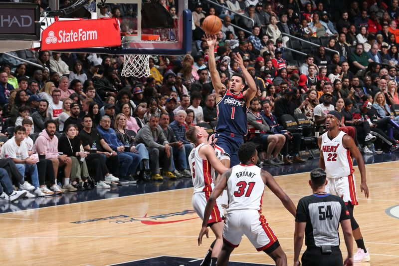 WASHINGTON, DC -? MARCH 31: Johnny Davis #1 of the Washington Wizards shoots the ball during the game against the Miami Heat on March 31, 2024 at Capital One Arena in Washington, DC. NOTE TO USER: User expressly acknowledges and agrees that, by downloading and or using this Photograph, user is consenting to the terms and conditions of the Getty Images License Agreement. Mandatory Copyright Notice: Copyright 2024 NBAE (Photo by Stephen Gosling/NBAE via Getty Images)