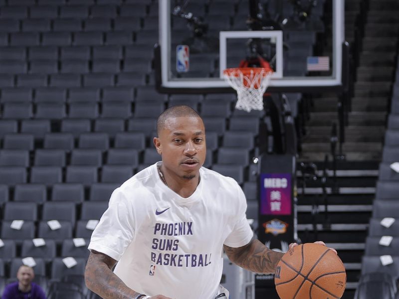 SACRAMENTO, CA - APRIL 12: Isaiah Thomas #4 of the Phoenix Suns warms up before the game against the Sacramento Kings on April 12, 2024 at Golden 1 Center in Sacramento, California. NOTE TO USER: User expressly acknowledges and agrees that, by downloading and or using this Photograph, user is consenting to the terms and conditions of the Getty Images License Agreement. Mandatory Copyright Notice: Copyright 2024 NBAE (Photo by Rocky Widner/NBAE via Getty Images)