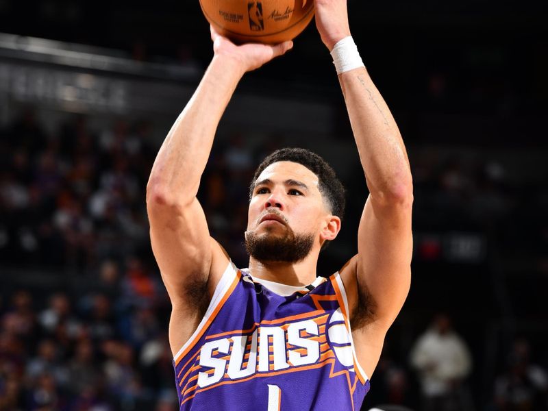 PHOENIX, AZ - NOVEMBER 2: Devin Booker #1 of the Phoenix Suns drives to the basket during the game against the Portland Trail Blazers on November 2, 2024 at Footprint Center in Phoenix, Arizona. NOTE TO USER: User expressly acknowledges and agrees that, by downloading and or using this photograph, user is consenting to the terms and conditions of the Getty Images License Agreement. Mandatory Copyright Notice: Copyright 2024 NBAE (Photo by Barry Gossage/NBAE via Getty Images)