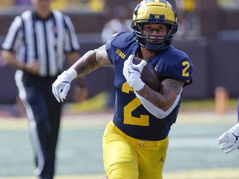 Sep 2, 2023; Ann Arbor, Michigan, USA; Michigan Wolverines running back Blake Corum (2) rushes in the first half against the East Carolina Pirates at Michigan Stadium. Mandatory Credit: Rick Osentoski-USA TODAY Sports