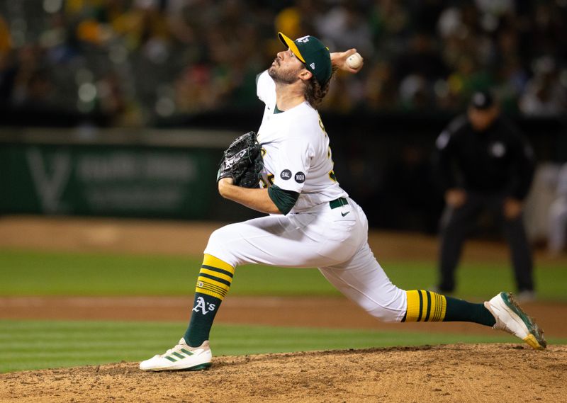 Jun 16, 2023; Oakland, California, USA; Oakland Athletics pitcher Chad Smith (30) delivers a pitch against the Philadelphia Phillies during the ninth inning at Oakland-Alameda County Coliseum. Mandatory Credit: D. Ross Cameron-USA TODAY Sports