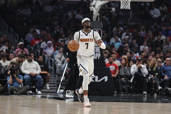 LOS ANGELES, CALIFORNIA - DECEMBER 06: Reggie Jackson #7 of the Denver Nuggets dribbles against the LA Clippers during the first half of a game at Crypto.com Arena on December 06, 2023 in Los Angeles, California. NOTE TO USER: User expressly acknowledges and agrees that, by downloading and or using this photograph, User is consenting to the terms and conditions of the Getty Images License Agreement. (Photo by Michael Owens/Getty Images)