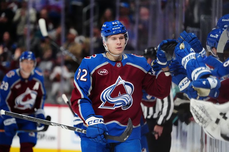 Nov 5, 2024; Denver, Colorado, USA; Colorado Avalanche center Ivan Ivan (82) celebrates his goal in the third period against the Seattle Kraken at Ball Arena. Mandatory Credit: Ron Chenoy-Imagn Images