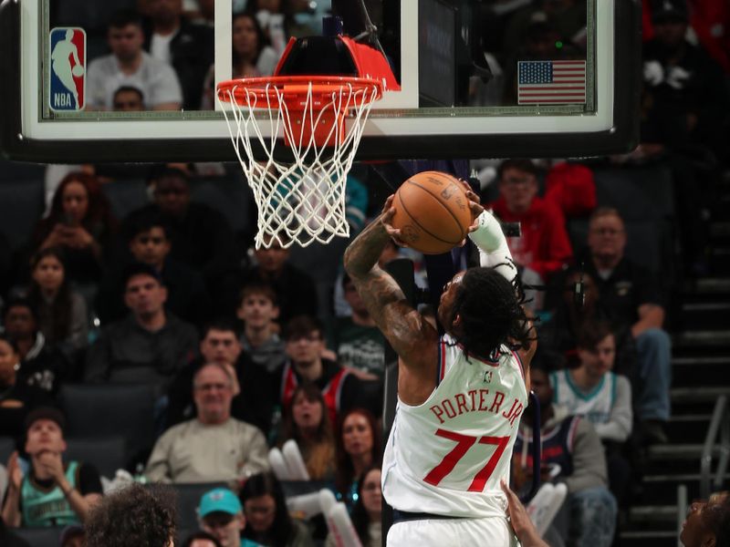 CHARLOTTE, NC - JANUARY 31: Kevin Porter Jr. #77 of the LA Clippers drives to the basket during the game against the Charlotte Hornets  on January 31, 2025 at Spectrum Center in Charlotte, North Carolina. NOTE TO USER: User expressly acknowledges and agrees that, by downloading and or using this photograph, User is consenting to the terms and conditions of the Getty Images License Agreement. Mandatory Copyright Notice: Copyright 2025 NBAE (Photo by Kent Smith/NBAE via Getty Images)