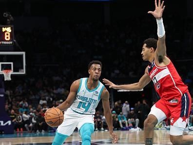 CHARLOTTE, NC - NOVEMBER 22: Ish Smith #14 of the Charlotte Hornets  drives to the basket during the game against the Washington Wizards on November 22, 2023 at Spectrum Center in Charlotte, North Carolina. NOTE TO USER: User expressly acknowledges and agrees that, by downloading and or using this photograph, User is consenting to the terms and conditions of the Getty Images License Agreement.  Mandatory Copyright Notice:  Copyright 2023 NBAE (Photo by Brock Williams-Smith/NBAE via Getty Images)