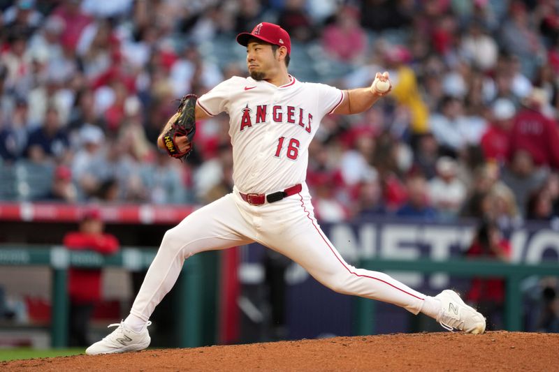 May 28, 2025; Anaheim, California, USA; Los Angeles Angels starting pitcher Yusei Kikuchi (16) throws in the second inning against the New York Yankees at Angel Stadium. Mandatory Credit: Kirby Lee-Imagn Images