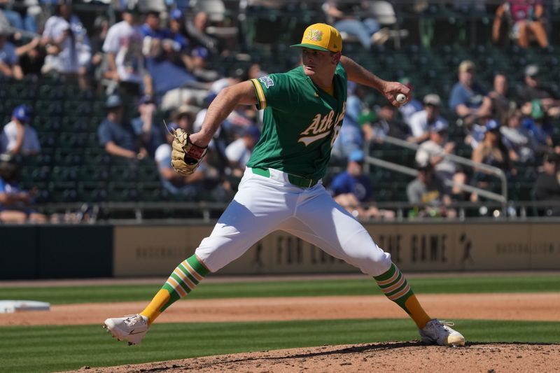 Mar 8, 2026; Mesa, Arizona, USA; Athletics pitcher Matt Krook (65) throws against the Los Angeles Dodgers in the third inning at Hohokam Stadium. Mandatory Credit: Rick Scuteri-Imagn Images