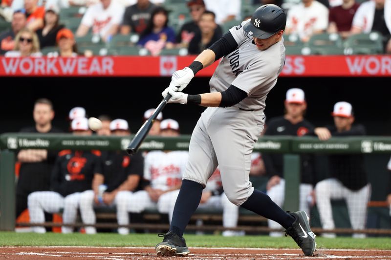 Apr 29, 2025; Baltimore, Maryland, USA; New York Yankees first baseman Ben Rice (22) hits a home run during the first inning against the Baltimore Orioles at Oriole Park at Camden Yards. Mandatory Credit: Daniel Kucin Jr.-Imagn Images