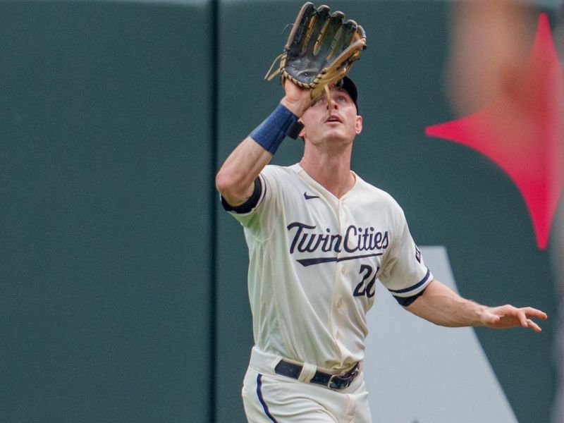 Sep 24, 2023; Minneapolis, Minnesota, USA; Minnesota Twins right fielder Max Kepler (26) catches a fly ball retiring Los Angeles Angels second baseman David Fletcher (22) in the fourth inning at Target Field. Mandatory Credit: Matt Blewett-USA TODAY Sports