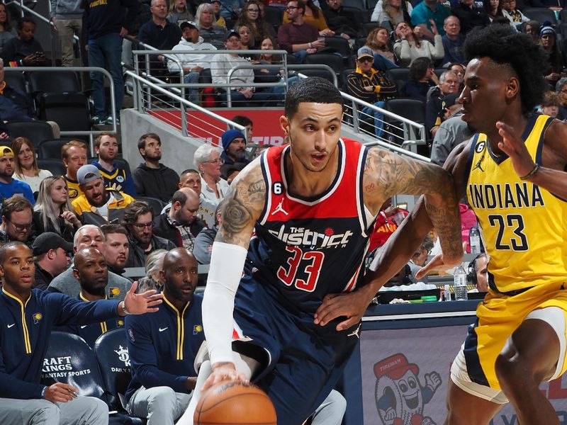 INDIANAPOLIS, IN - DECEMBER 9: Kyle Kuzma #33 of the Washington Wizards dribbles the ball during the game against the Indiana Pacers on December 9, 2022 at Gainbridge Fieldhouse in Indianapolis, Indiana. NOTE TO USER: User expressly acknowledges and agrees that, by downloading and or using this Photograph, user is consenting to the terms and conditions of the Getty Images License Agreement. Mandatory Copyright Notice: Copyright 2022 NBAE (Photo by Ron Hoskins/NBAE via Getty Images)