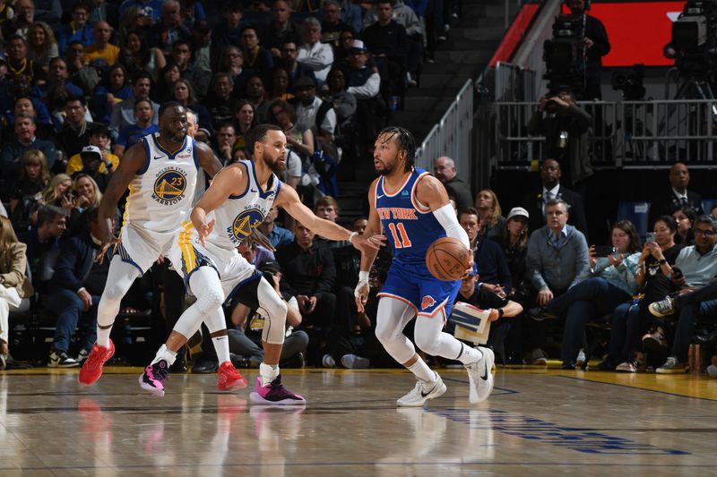 SAN FRANCISCO, CA - MARCH 18: Jalen Brunson #11 of the New York Knicks dribbles the ball during the game against the Golden State Warriors on MARCH 18, 2024 at Chase Center in San Francisco, California. NOTE TO USER: User expressly acknowledges and agrees that, by downloading and or using this photograph, user is consenting to the terms and conditions of Getty Images License Agreement. Mandatory Copyright Notice: Copyright 2024 NBAE (Photo by Noah Graham/NBAE via Getty Images)