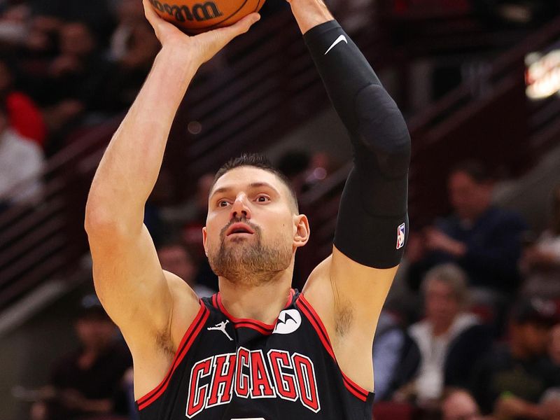 CHICAGO, ILLINOIS - NOVEMBER 07: Nikola Vucevic #9 of the Chicago Bulls shoots against the Minnesota Timberwolves during the first half at the United Center on November 07, 2024 in Chicago, Illinois. NOTE TO USER: User expressly acknowledges and agrees that, by downloading and or using this photograph, User is consenting to the terms and conditions of the Getty Images License Agreement.  (Photo by Michael Reaves/Getty Images)