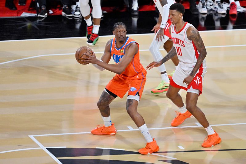 LAS VEGAS, NV - DECEMBER 14: Jalen Williams #8 of the Oklahoma City Thunder looks to pass the ball during the game against the Houston Rockets during the Emirates NBA Cup Semifinal game on December 14, 2024 at T-Mobile Arena in Las Vegas, Nevada. NOTE TO USER: User expressly acknowledges and agrees that, by downloading and/or using this Photograph, user is consenting to the terms and conditions of the Getty Images License Agreement. Mandatory Copyright Notice: Copyright 2024 NBAE (Photo by David Becker/NBAE via Getty Images)