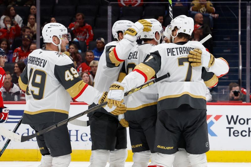 Oct 15, 2024; Washington, District of Columbia, USA; Vegas Golden Knights center Jack Eichel (9) celebrates with teammates after scoring a goal against the Washington Capitals in the second period at Capital One Arena. Mandatory Credit: Geoff Burke-Imagn Images