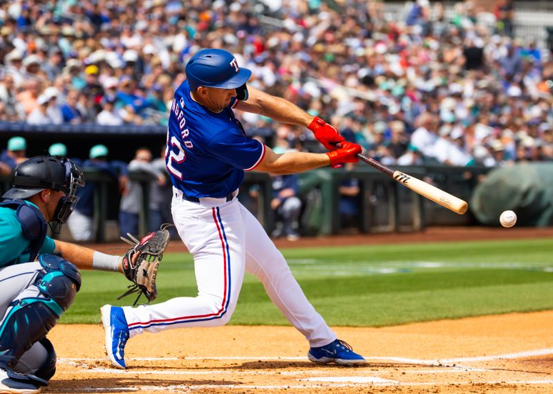 Mar 18, 2024; Surprise, Arizona, USA; Texas Rangers outfielder Wyatt Langford against the Seattle Mariners during a spring training baseball game at Surprise Stadium. Mandatory Credit: Mark J. Rebilas-USA TODAY Sports