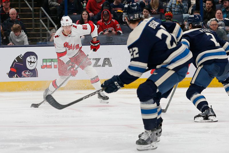 Feb 29, 2024; Columbus, Ohio, USA; Carolina Hurricanes center Martin Necas (88) wrists a shot on goal against the Columbus Blue Jackets during the second period at Nationwide Arena. Mandatory Credit: Russell LaBounty-USA TODAY Sports