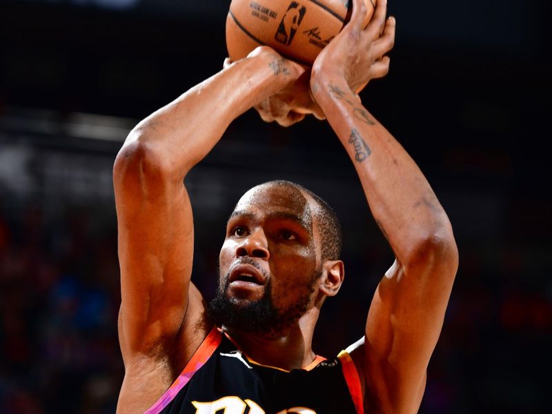 PHOENIX, AZ - APRIL 16:  Kevin Durant #35 of the Phoenix Suns shoots a free throw during the game During round one game one of the 2023 NBA Playoffs on April 16, 2023 at Footprint Center in Phoenix, Arizona. NOTE TO USER: User expressly acknowledges and agrees that, by downloading and or using this photograph, user is consenting to the terms and conditions of the Getty Images License Agreement. Mandatory Copyright Notice: Copyright 2023 NBAE (Photo by Barry Gossage/NBAE via Getty Images)