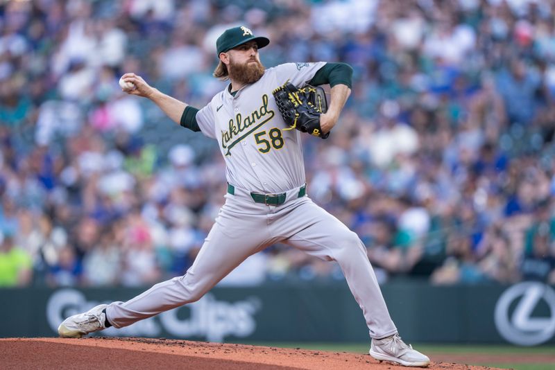 May 8, 2024; Seattle, Washington, USA; Oakland Athletics starter Paul Blackburn (58) delivers a pitch during the first inning against the Seattle Mariners at Lumen Field. Mandatory Credit: Stephen Brashear-USA TODAY Sports