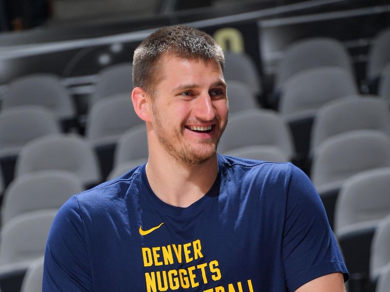 SAN ANTONIO, TX - APRIL 12: Nikola Jokic #15 of the Denver Nuggets looks on before the game on April 12, 2024 at the AT&T Center in San Antonio, Texas. NOTE TO USER: User expressly acknowledges and agrees that, by downloading and or using this photograph, user is consenting to the terms and conditions of the Getty Images License Agreement. Mandatory Copyright Notice: Copyright 2024 NBAE (Photos by Michael Gonzales/NBAE via Getty Images)