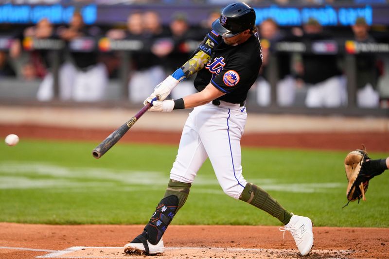 May 21, 2023; New York City, New York, USA;  New York Mets second baseman Jeff McNeil (1) hits a single against the Cleveland Guardians during the first inning at Citi Field. Mandatory Credit: Gregory Fisher-USA TODAY Sports