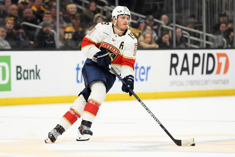 Apr 6, 2024; Boston, Massachusetts, USA; Florida Panthers left wing Matthew Tkachuk (19) skates with the puck during overtime against the Boston Bruins at TD Garden. Mandatory Credit: Bob DeChiara-USA TODAY Sports