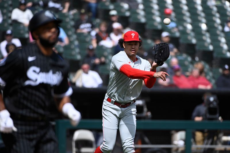 Apr 19, 2023; Chicago, Illinois, USA;  Philadelphia Phillies starting pitcher Taijuan Walker (99) throws out Chicago White Sox second baseman Elvis Andrus (1) during the third inning at Guaranteed Rate Field. Mandatory Credit: Matt Marton-USA TODAY Sports