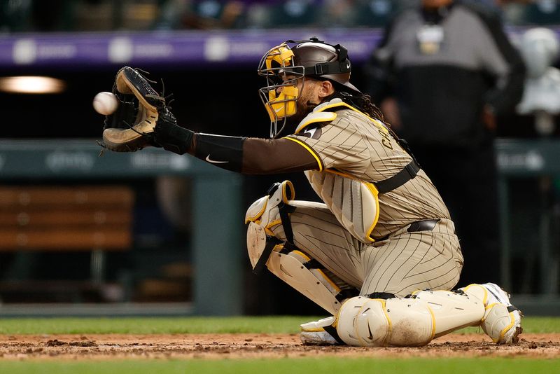 Apr 22, 2024; Denver, Colorado, USA; San Diego Padres catcher Luis Campusano (12) in the middle of the fifth inning against the Colorado Rockies at Coors Field. Mandatory Credit: Isaiah J. Downing-USA TODAY Sports