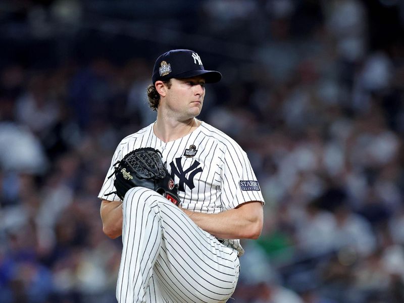 Oct 30, 2024; New York, New York, USA; New York Yankees pitcher Gerrit Cole (45) pitches during the fourth inning against the Los Angeles Dodgers in game four of the 2024 MLB World Series at Yankee Stadium. Mandatory Credit: Brad Penner-Imagn Images