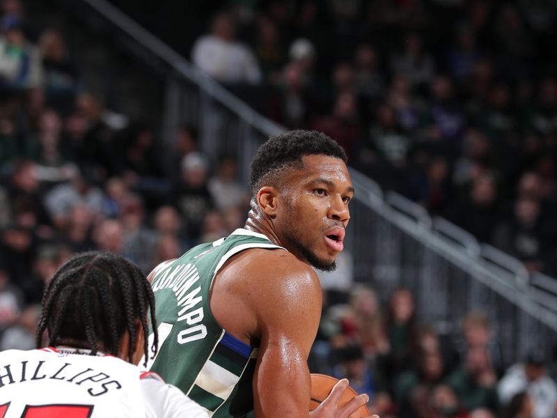 MILWAUKEE, WI - NOVEMBER 20: Giannis Antetokounmpo #34 of the Milwaukee Bucks looks on during the game against the Chicago Bulls on November 20, 2024 at the Fiserv Forum Center in Milwaukee, Wisconsin. NOTE TO USER: User expressly acknowledges and agrees that, by downloading and or using this Photograph, user is consenting to the terms and conditions of the Getty Images License Agreement. Mandatory Copyright Notice: Copyright 2024 NBAE (Photo by Gary Dineen/NBAE via Getty Images).