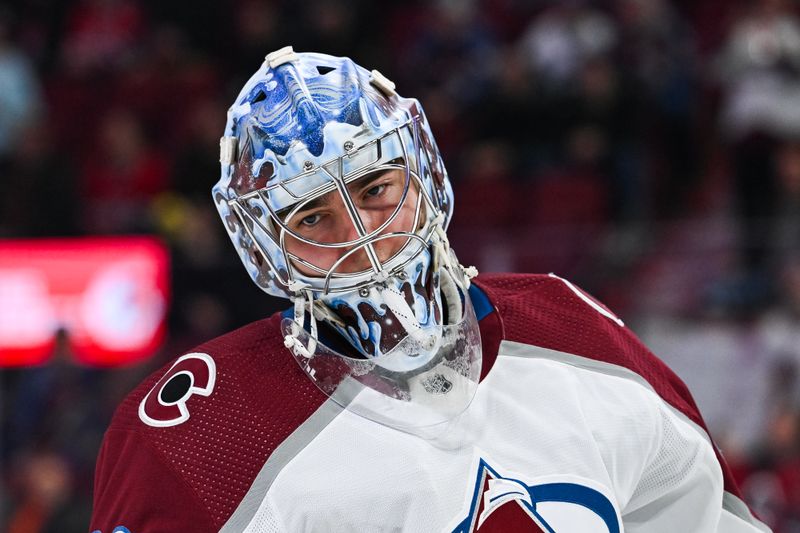 Jan 15, 2024; Montreal, Quebec, CAN; Colorado Avalanche goalie Justus Annunen (60) looks on during warm-up before the game against the Montreal Canadiens at Bell Centre. Mandatory Credit: David Kirouac-USA TODAY Sports