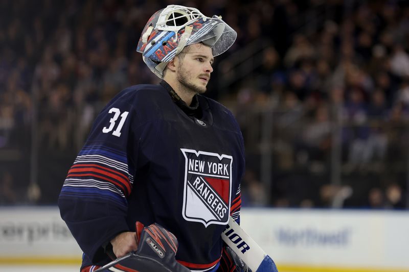 Dec 6, 2024; New York, New York, USA; New York Rangers goaltender Igor Shesterkin (31) skates back to his position after a TV time out during the second period against the Pittsburgh Penguins at Madison Square Garden. Mandatory Credit: Brad Penner-Imagn Images