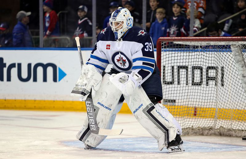 Mar 19, 2024; New York, New York, USA; Winnipeg Jets goalie Laurent Brossoit (39) during warmups before the first period against the New York Rangers at Madison Square Garden. Mandatory Credit: Danny Wild-USA TODAY Sports