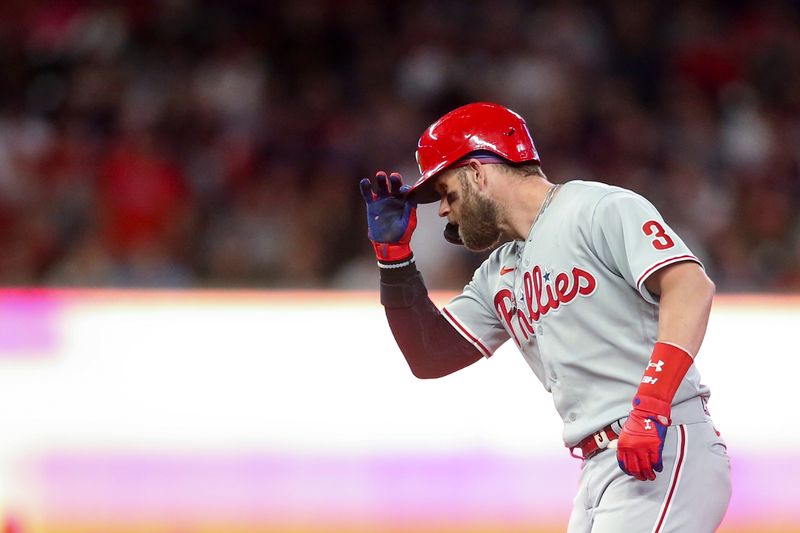 Oct 12, 2022; Atlanta, Georgia, USA; Philadelphia Phillies designated hitter Bryce Harper (3) reacts after hitting a double against the Atlanta Braves in the second inning during game two of the NLDS for the 2022 MLB Playoffs at Truist Park. Mandatory Credit: Brett Davis-USA TODAY Sports