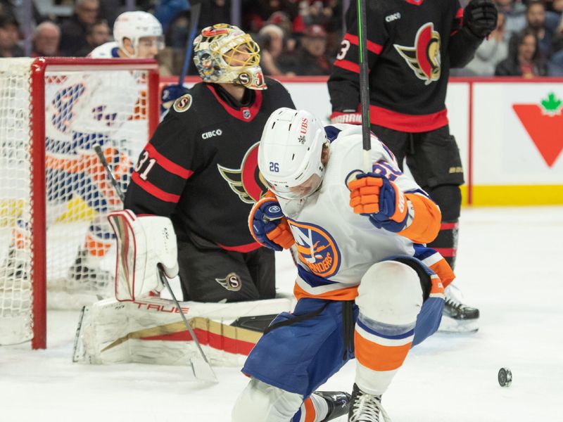 Nov 24, 2023; Ottawa, Ontario, CAN; New York Islanders right wing Oliver Wahlstrom (26) celebrates his goal scored in the second period against the Ottawa Senators at the Canadian Tire Centre. Mandatory Credit: Marc DesRosiers-USA TODAY Sports