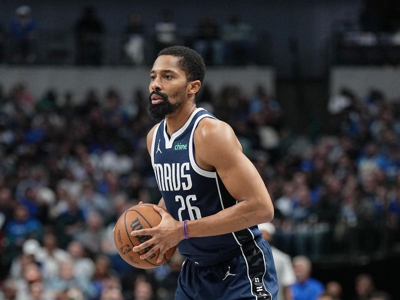 DALLAS, TX - NOVEMBER 8: Spencer Dinwiddie #26 of the Dallas Mavericks looks to pass the ball during the game against the Phoenix Suns on November 6, 2024 at the American Airlines Center in Dallas, Texas. NOTE TO USER: User expressly acknowledges and agrees that, by downloading and or using this photograph, User is consenting to the terms and conditions of the Getty Images License Agreement. Mandatory Copyright Notice: Copyright 2024 NBAE (Photo by Glenn James/NBAE via Getty Images)