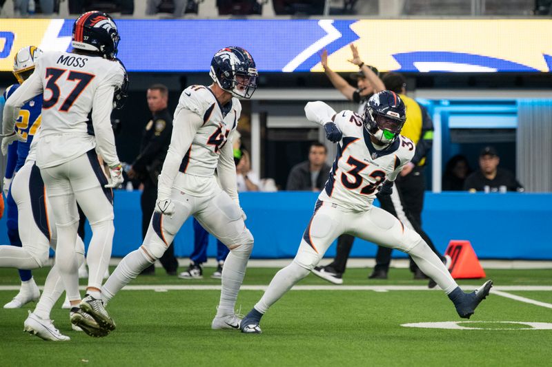 Denver Broncos safety Delarrin Turner-Yell (32) reacts during an NFL football game against the Los Angeles Chargers, Sunday, Dec. 10, 2023, in Inglewood, Calif. (AP Photo/Kyusung Gong)