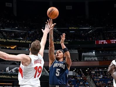 ORLANDO, FL - NOVEMBER 21: Paolo Banchero #5 of the Orlando Magic shoots the ball during the game against the Toronto Raptors during the In-Season Tournament on November 21, 2023 at Amway Center in Orlando, Florida. NOTE TO USER: User expressly acknowledges and agrees that, by downloading and or using this photograph, User is consenting to the terms and conditions of the Getty Images License Agreement. Mandatory Copyright Notice: Copyright 2023 NBAE (Photo by Fernando Medina/NBAE via Getty Images)