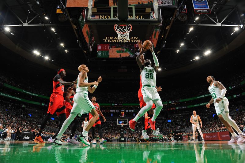 BOSTON, MA - OCTOBER 13: Neemias Queta #88 of the Boston Celtics shoots the ball during the game against the Toronto Raptors during a NBA pre season game on October 13, 2024 at TD Garden in Boston, Massachusetts. NOTE TO USER: User expressly acknowledges and agrees that, by downloading and/or using this Photograph, user is consenting to the terms and conditions of the Getty Images License Agreement. Mandatory Copyright Notice: Copyright 2024 NBAE (Photo by Brian Babineau/NBAE via Getty Images)