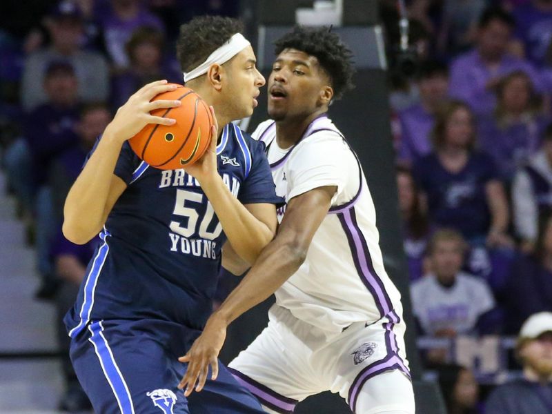 Feb 24, 2024; Manhattan, Kansas, USA; Brigham Young Cougars center Aly Khalifa (50) is guarded by Kansas State Wildcats forward Jerrell Colbert (20) during the first half at Bramlage Coliseum. Mandatory Credit: Scott Sewell-USA TODAY Sports