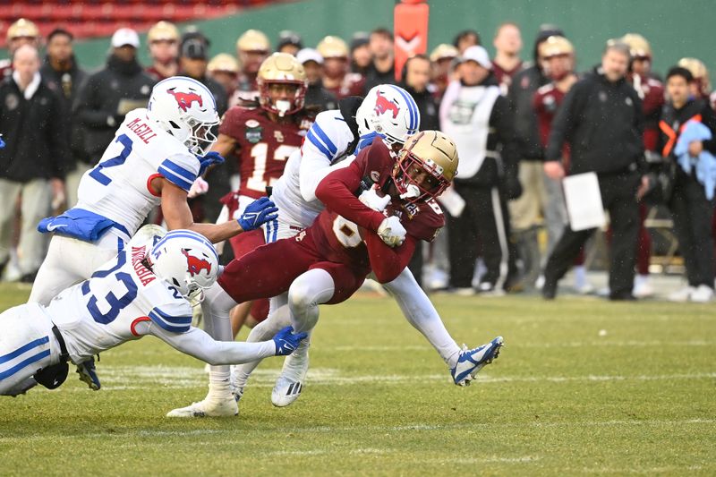 iDec 28, 2023; Boston, MA, USA; Boston College Eagles wide receiver Jaedn Skeete (6)  gets tackled during the second half against the Southern Methodist Mustangs at Fenway Park. Mandatory Credit: Eric Canha-USA TODAY Sports