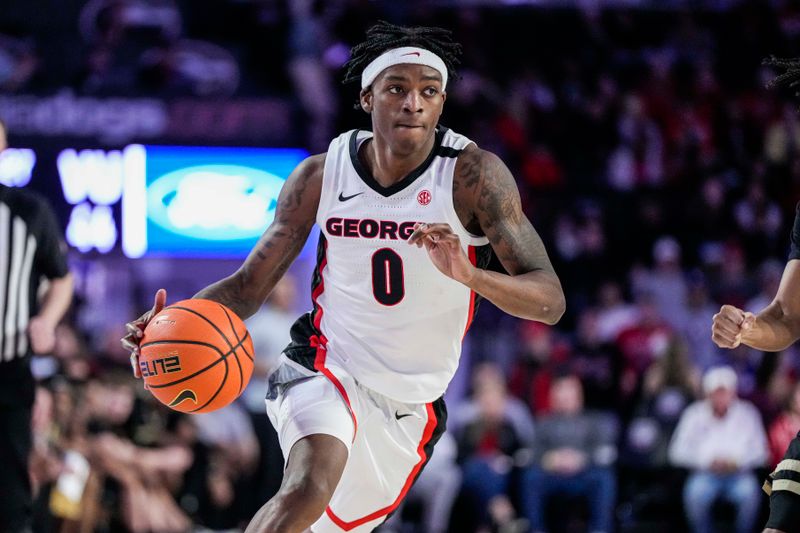 Jan 21, 2023; Athens, Georgia, USA; Georgia Bulldogs guard Terry Roberts (0) brings the ball up the court against the Vanderbilt Commodores during the second half at Stegeman Coliseum. Mandatory Credit: Dale Zanine-USA TODAY Sports