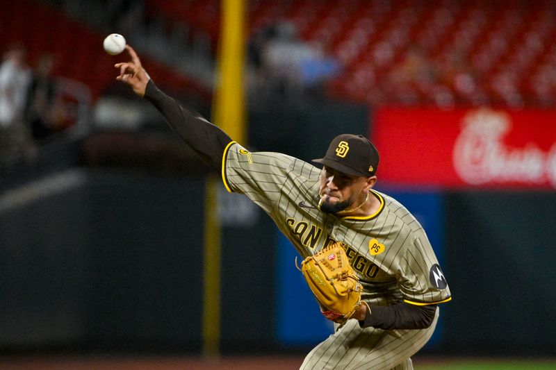 Aug 26, 2024; St. Louis, Missouri, USA;  San Diego Padres relief pitcher Robert Suarez (75) pitches against the St. Louis Cardinals during the ninth inning at Busch Stadium. Mandatory Credit: Jeff Curry-USA TODAY Sports