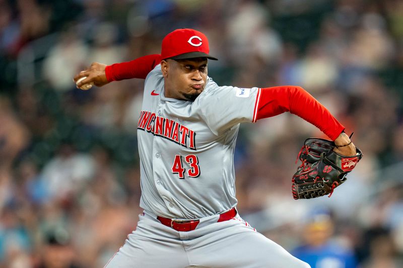 Sep 13, 2024; Minneapolis, Minnesota, USA; Cincinnati Reds pitcher Alexis Díaz (43) delivers a pitch against the Minnesota Twins in the ninth inning at Target Field. Mandatory Credit: Jesse Johnson-Imagn Images