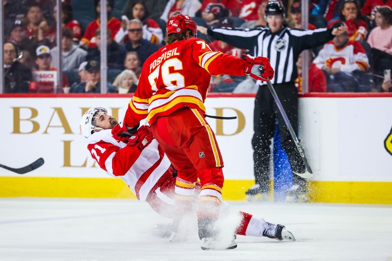 Feb 17, 2024; Calgary, Alberta, CAN; Calgary Flames center Martin Pospisil (76) checks Detroit Red Wings center Dylan Larkin (71) during the second period at Scotiabank Saddledome. Mandatory Credit: Sergei Belski-USA TODAY Sports