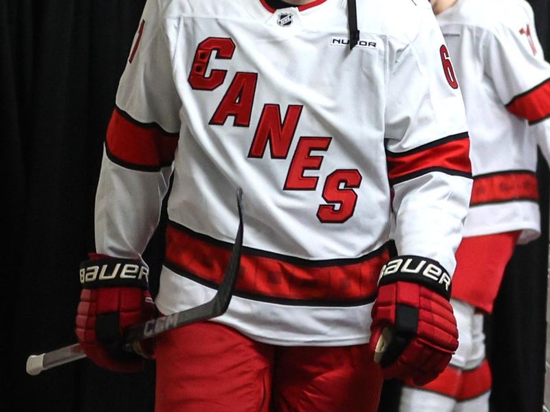 Jan 28, 2025; New York, New York, USA;  Carolina Hurricanes defenseman Riley Stillman (61) comes out for the start of the third period against the New York Rangers at Madison Square Garden. Mandatory Credit: Wendell Cruz-Imagn Images