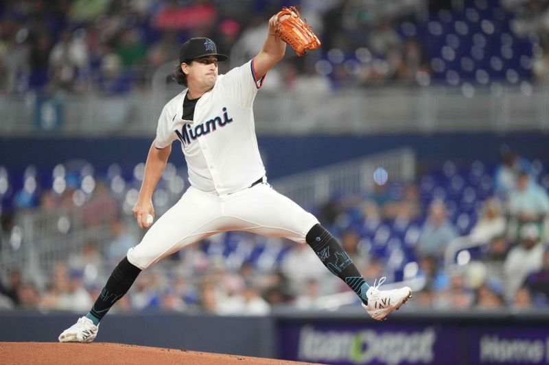 May 6, 2025; Miami, Florida, USA;  Miami Marlins pitcher Cal Quantrill (47) pitches in the first inning against the Los Angeles Dodgers at loanDepot Park. Mandatory Credit: Jim Rassol-Imagn Images