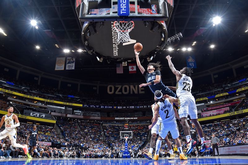 ORLANDO, FL - OCTOBER 28: Anthony Black #0 of the Orlando Magic drives to the basket during the game against the Indiana Pacers on October 28, 2024 at Kia Center in Orlando, Florida. NOTE TO USER: User expressly acknowledges and agrees that, by downloading and or using this photograph, User is consenting to the terms and conditions of the Getty Images License Agreement. Mandatory Copyright Notice: Copyright 2024 NBAE (Photo by Fernando Medina/NBAE via Getty Images)