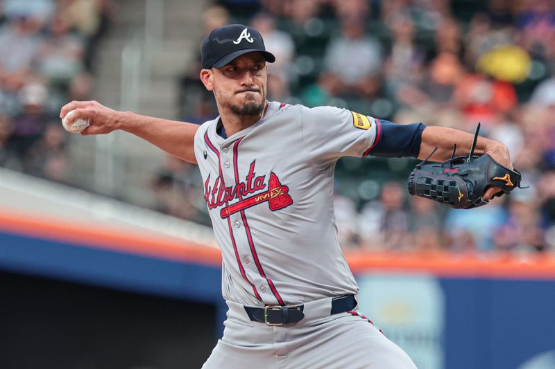 Jul 26, 2024; New York City, New York, USA; Atlanta Braves starting pitcher Charlie Morton (50) delivers a pitch during the first inning against the New York Mets at Citi Field. Mandatory Credit: Vincent Carchietta-USA TODAY Sports